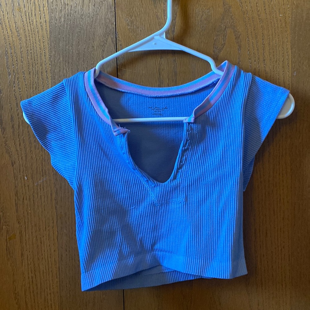 Go for gold Urban Outfitters seamless top! Size XS. Never worn!
